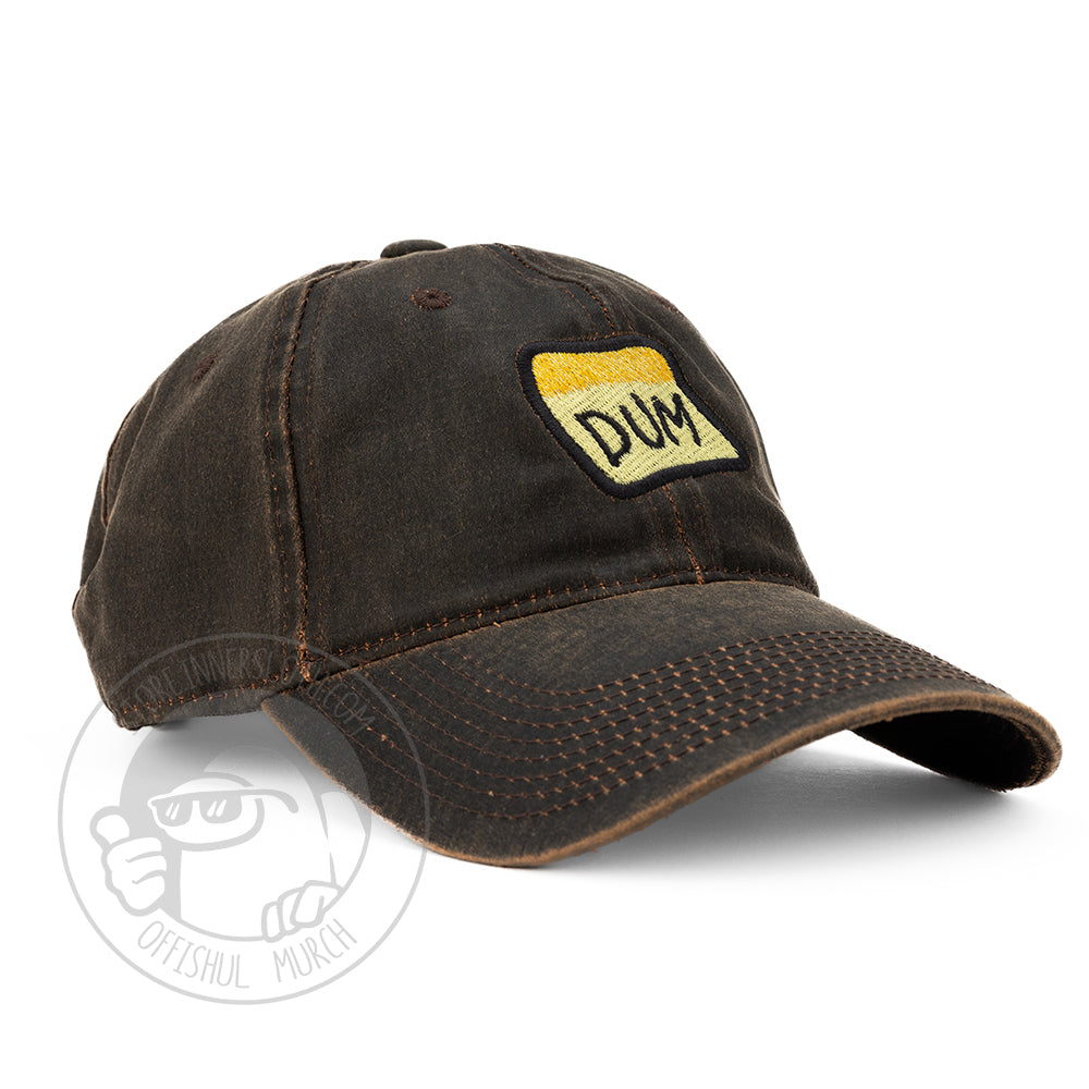Three-quarter view photo of the brown DUM hat
