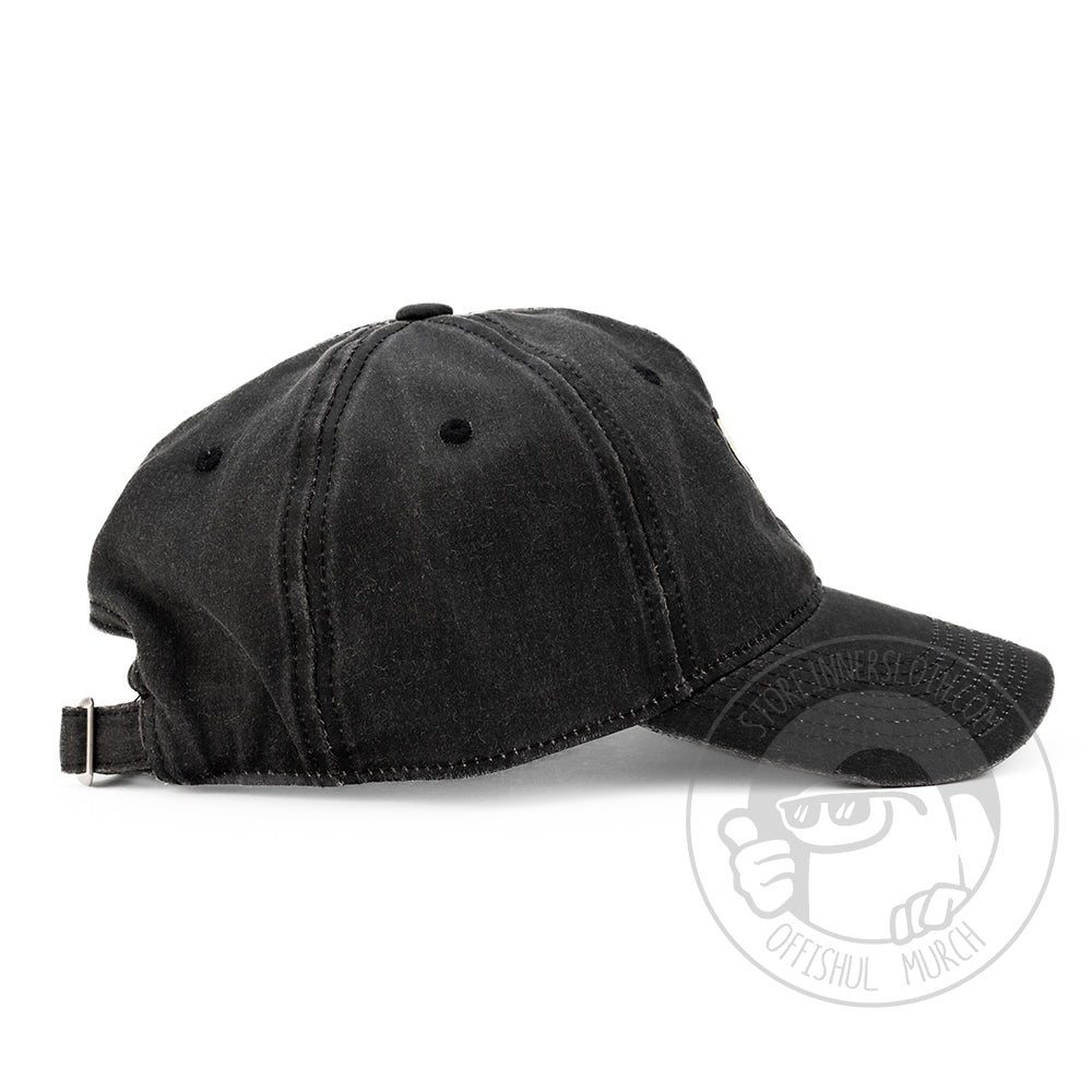  Profile photo of the black DUM hat from the side. 