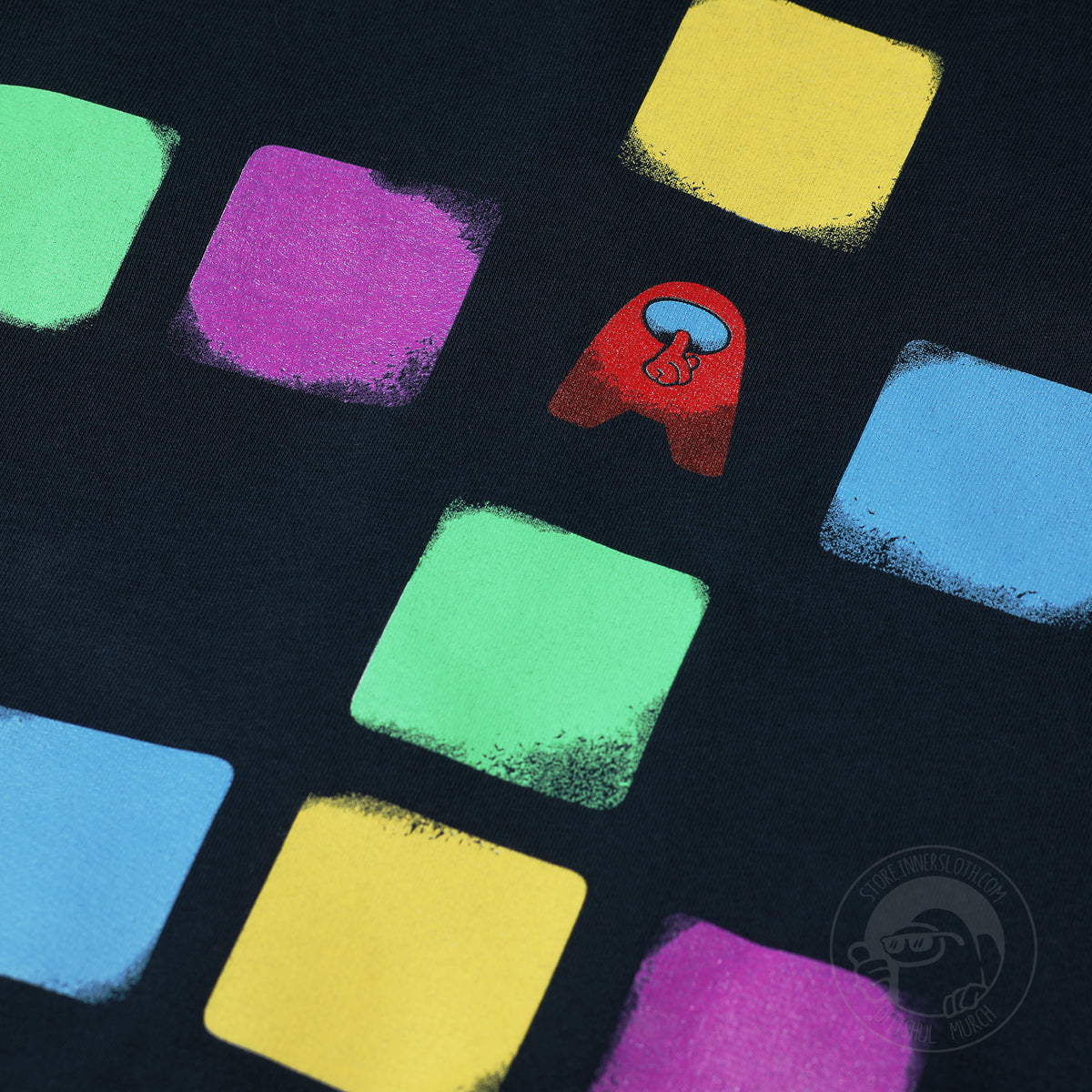 A closeup of the artwork on the back of the Among Us: Cosmicube Hoodie.