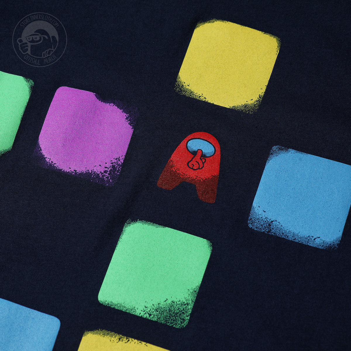 A closeup of the artwork on the back of the Among Us: Cosmicube Tee.