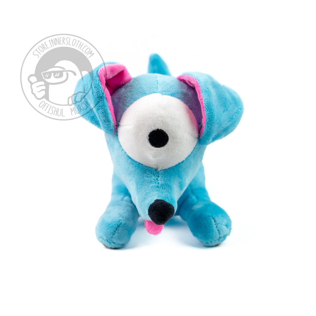 A front view photo of the Doggy plush on a white background, showing off the large eyeball, tiny black nose, and pink tongue. 