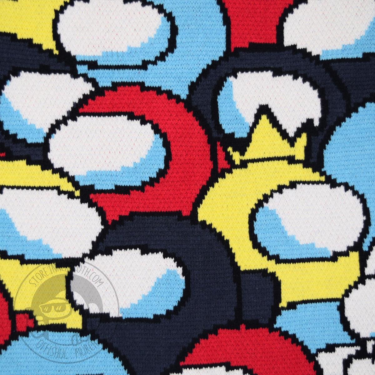 A close up section of the cardigan’s overlapping All-Over-Pattern pattern with red, yellow, cyan, and dark gray color Crewmates. 