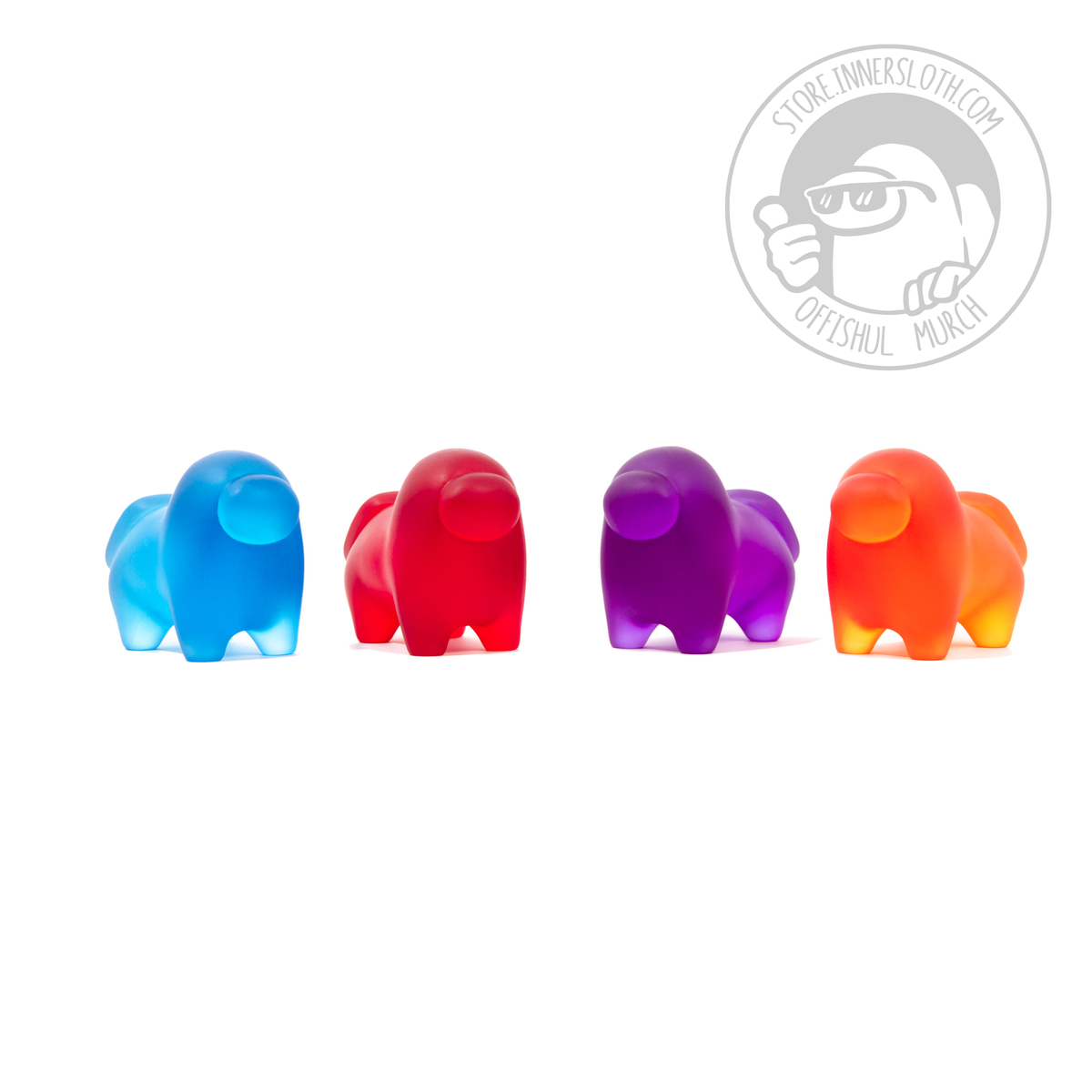 A photograph of all four translucent Crewgi Figurines on a white background. They are standing side-by-side in a 3/4 view. The order of Crewgis left to right is blue, red, purple, orange.
