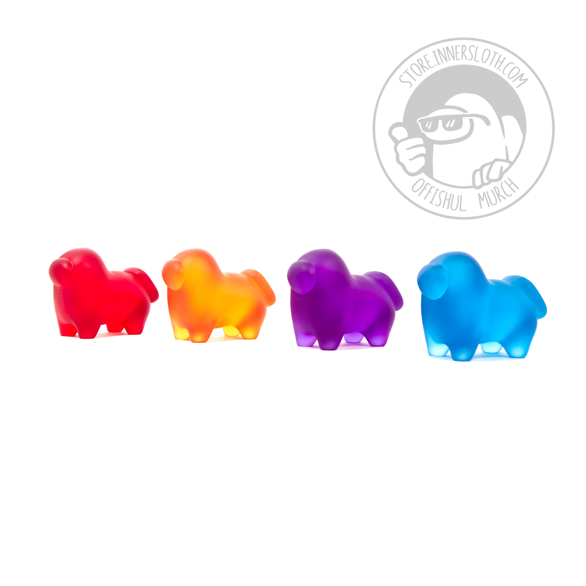 A photograph of all four translucent Crewgi Figurines on a white background. They are standing side-by-side in a diagonal profile view spaced out from each other. The order of Crewgis left to right is red, orange, purple, blue.  