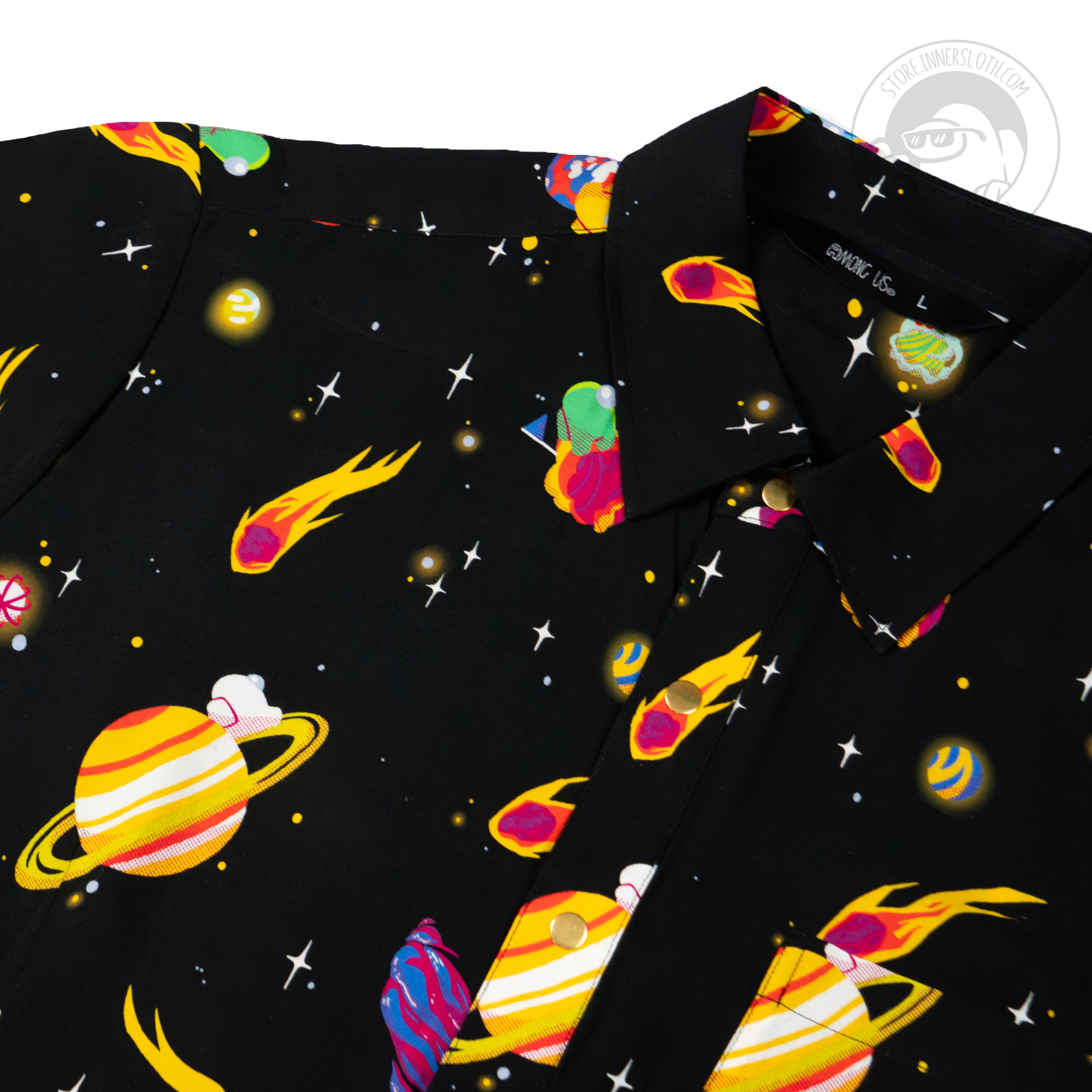 The front of a black short-sleeved button-up shirt on a white background. The black button-up is covered in crewmates from Among Us, as well as meteors, shooting stars, and planets.