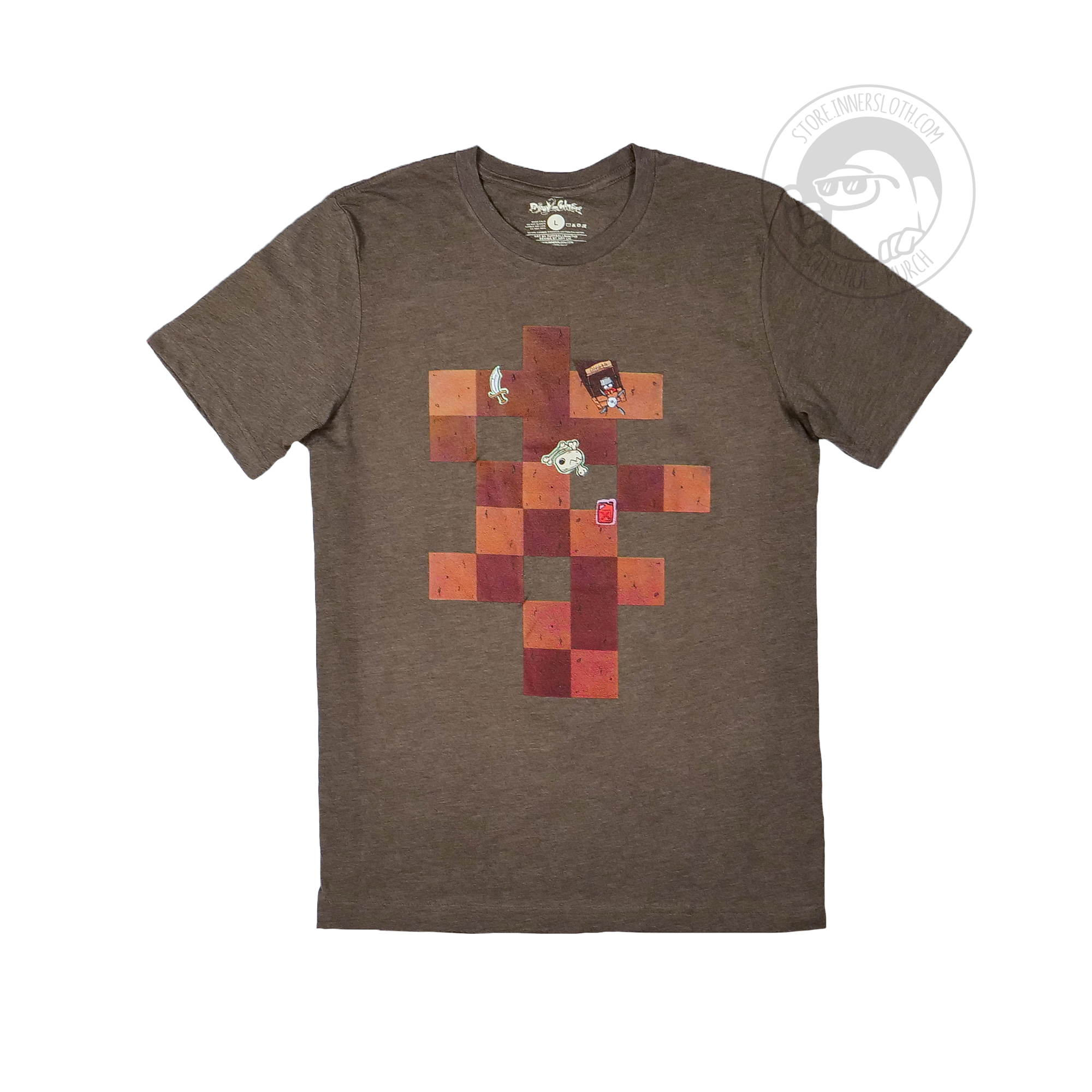 The front of a brown T-shirt with a brown square pattern on it. Scattered on the brown square pattern are a cuirass, an animal skull, a wooden stall saying “Digger” with a person behind it, and a jar of gasoline. The brown T-shirt is on a white background.