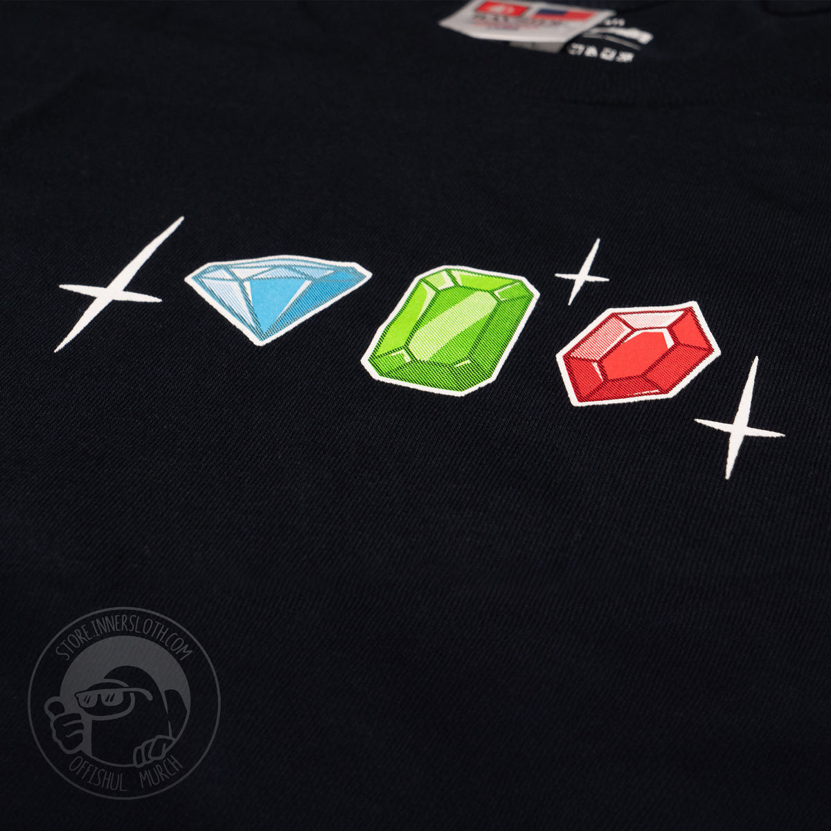 A close up photograph of the shirt decal showing off the gems and sparkles. 