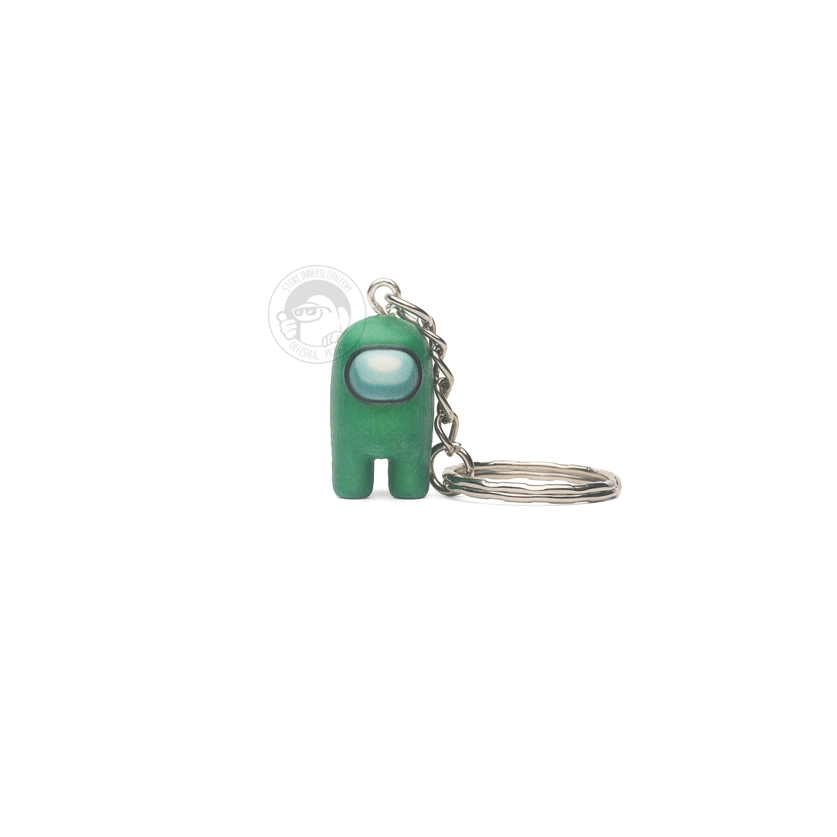 A product photo of the Among Us: Crewmate Keychain by Objex Unlimited Inc. in green. It is standing, and a silver keychain rests beside it.