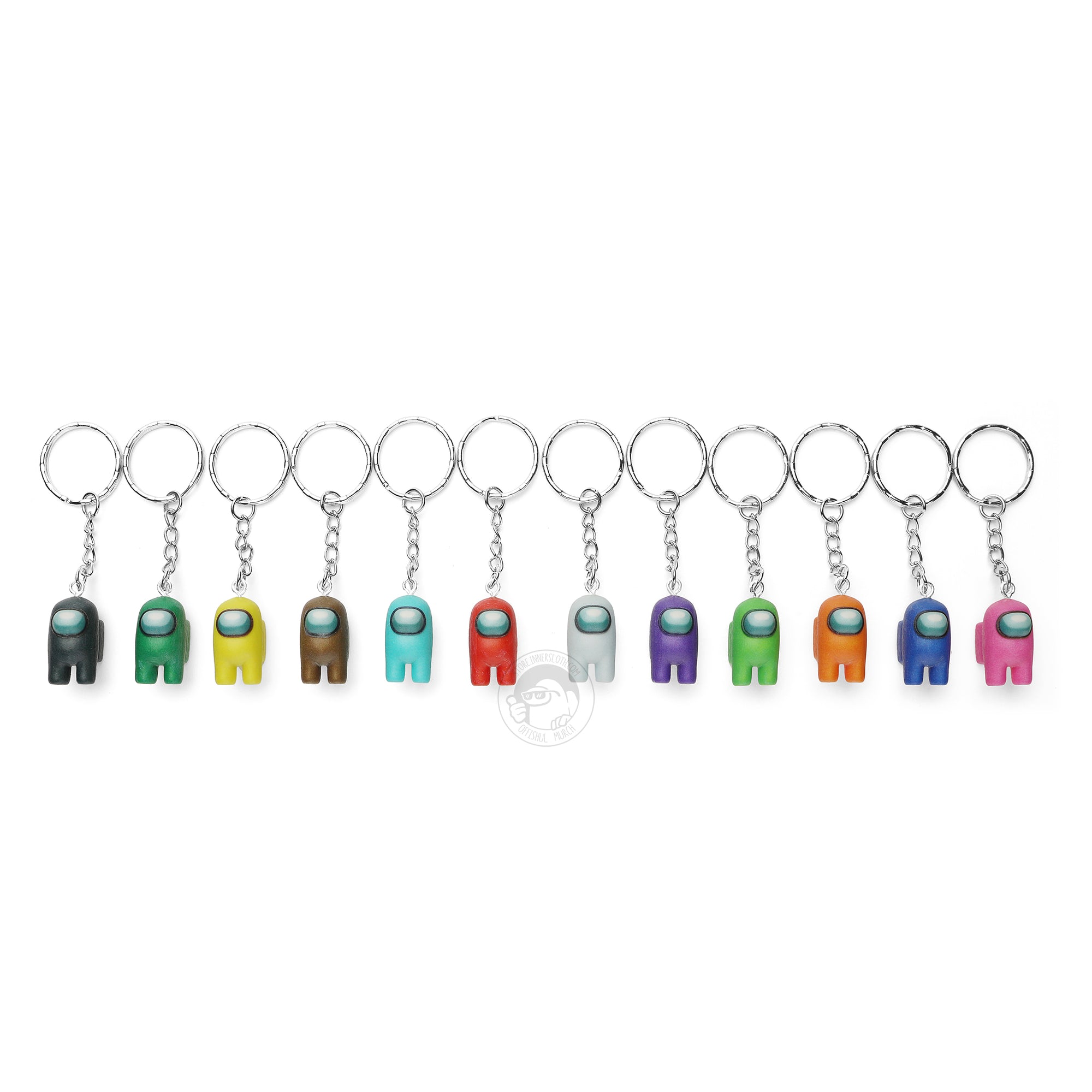 A product photo of all twelve variant colors of the Among Us: Crewmate Keychain by Objex Unlimited Inc. They are laying diagonally across the photo and each has a silver keychain. The colors are as follows: black, green, yellow, brown, cyan, red, white, purple, lime, orange, blue, and pink.