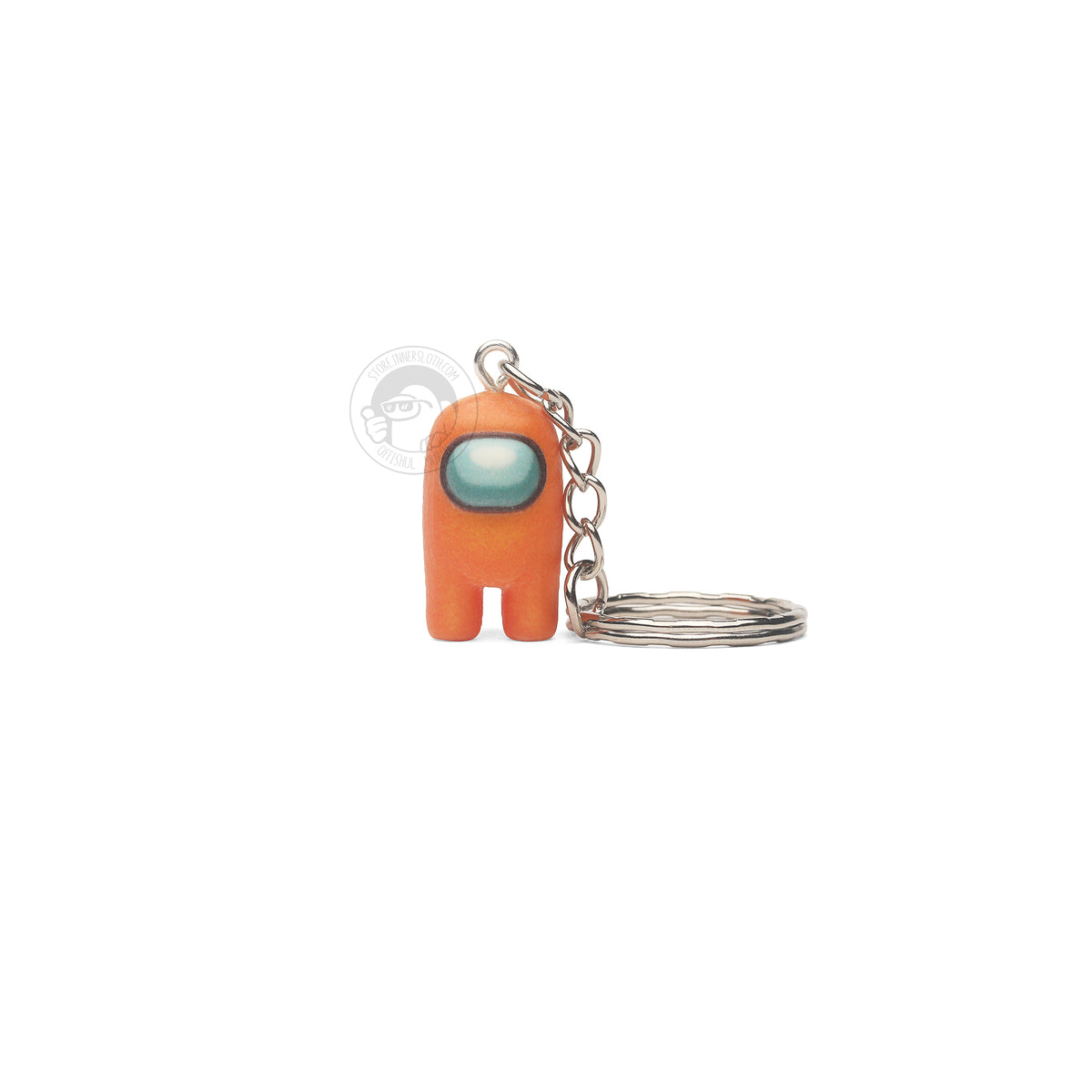 A product photo of the Among Us: Crewmate Keychain by Objex Unlimited Inc. in orange. It is standing, and a silver keychain rests beside it.