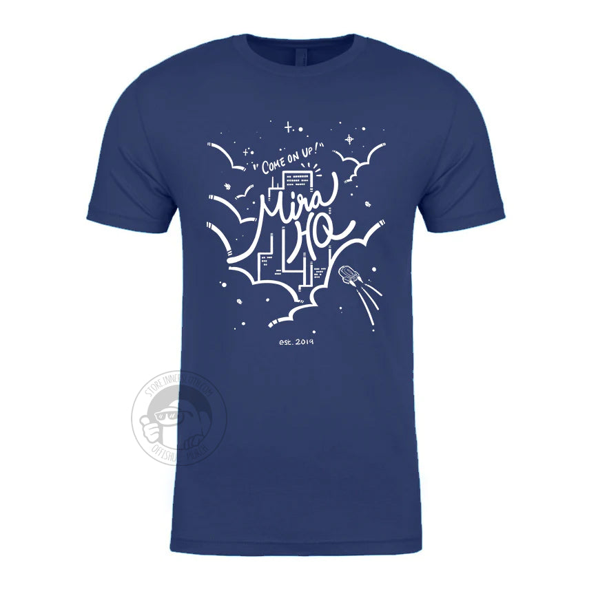 A product photo of the Among us: Come On Up to MIRA HQ Tee in blue. The white lineart on the shirt outlines a cityscape among the clouds, with stars sprinkled around. Small text reads “Come On Up!” above a larger cursive “Mira HQ”. A small crewmate is flying toward it.