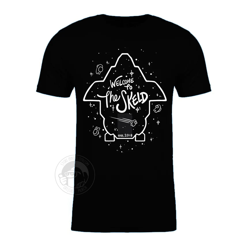 A product photo of the Among us: Welcome to The Skeld Tee in black. The white lineart on the shirt outlines the perimeter of the Skeld game map, with white stars and small crewmates sprinkled around it.