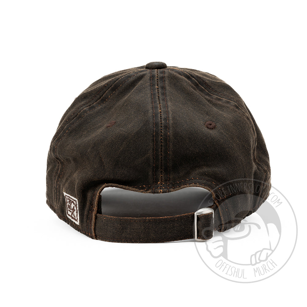 Backview photo of the brown DUM hat to show adjustable strap.