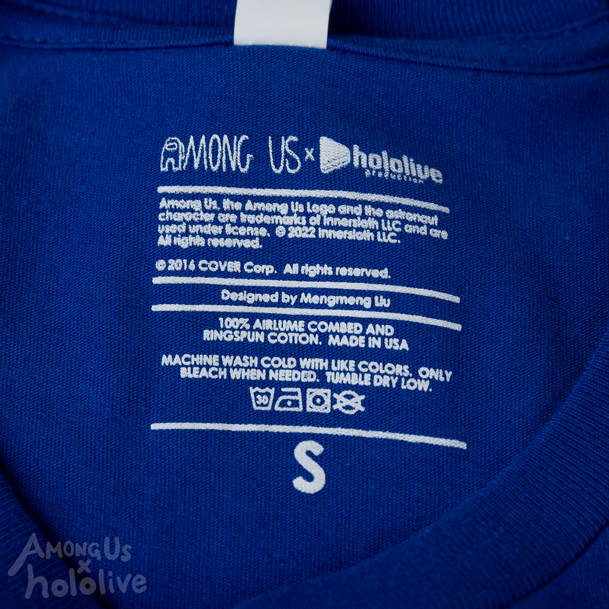 A closeup photo of the t-shirt care information and size, printed directly on the fabric.