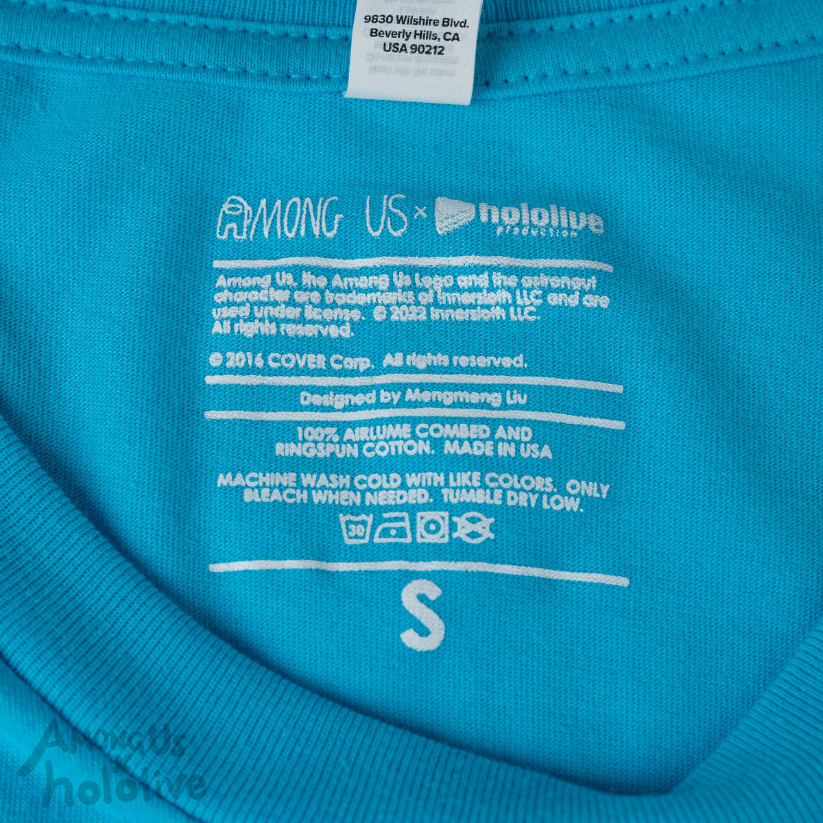 A closeup photo of the t-shirt care information and size, printed directly on the fabric.