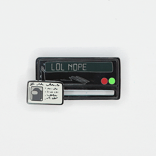 An animated gif of a model swiping the card key element of the Among Us: Card Key Task Sliding Pin by SABERKINGART. The card key resembles a mock ID and has a greyscale crewmate and scribbles. The black, rectangular background pin reads “LOL NOPE.”