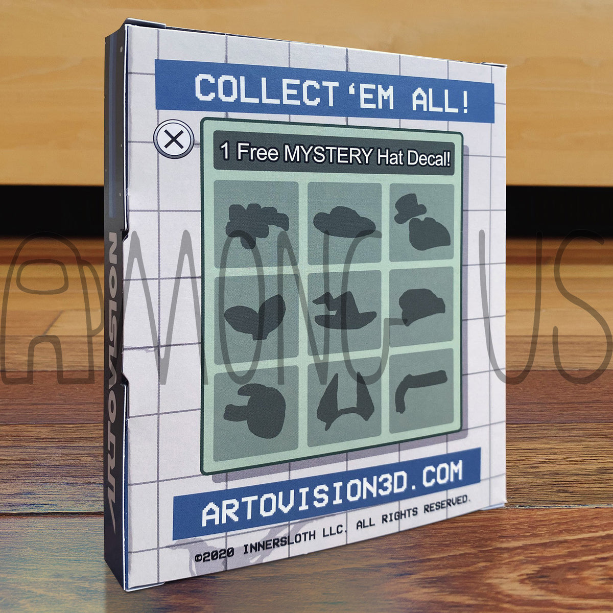 A photo of the back of the Crewmate Art Tiles box. This advertises a free mystery hat decal. All of them are silhouetted and greyed out. The box reads “Collect ‘em all!” and provides the Artovision3D website: artovision3d.com. 