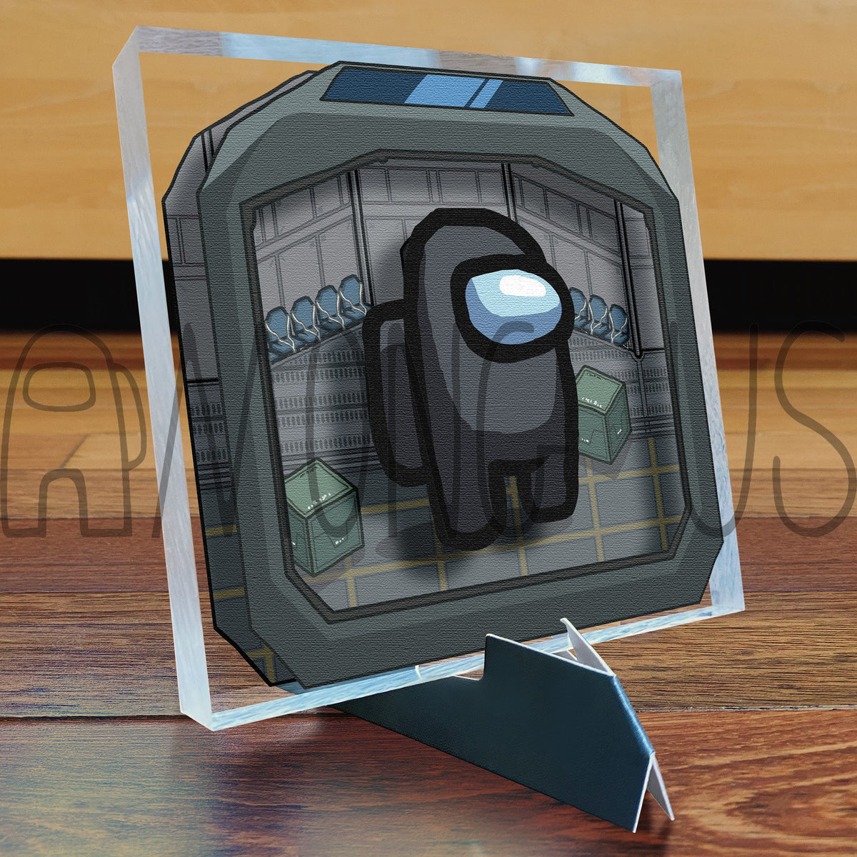A photograph of the black Crewmate Art Tile displayed on its art tile stand.